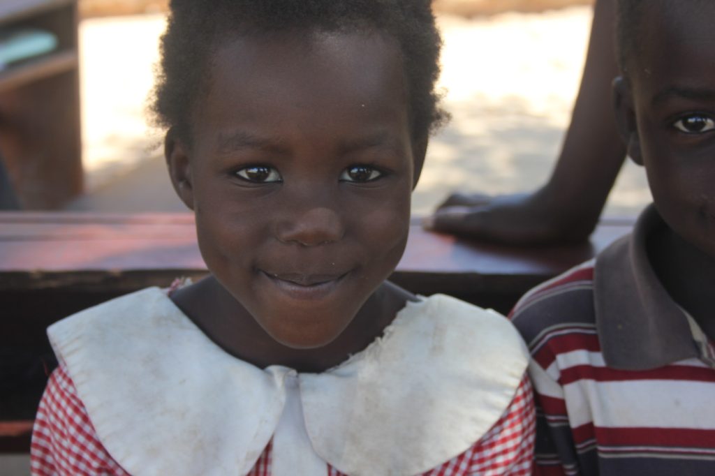 Smiling Flavia is in the last year of nursery at Wil Lacic nursery in northern Uganda