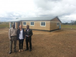 The AR Zambia team in front of the new teacher housing.