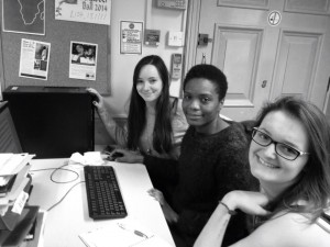 Emily, Ayo and Rachel working on a DFID application