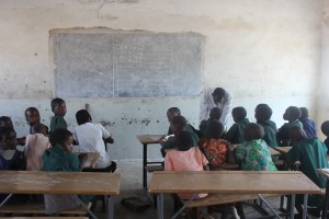 teacher working with his pupils
